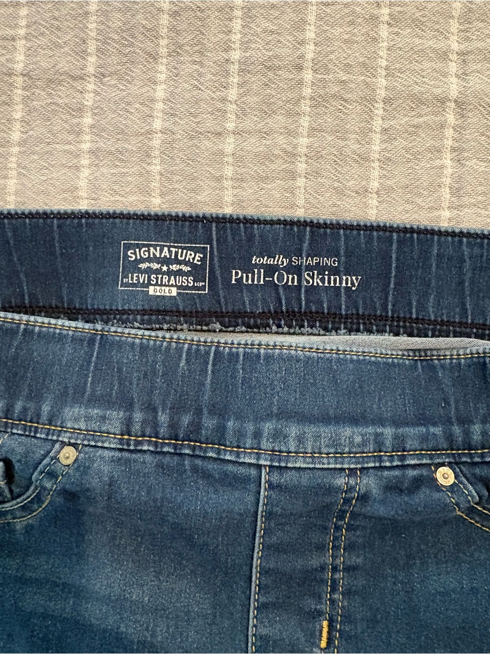 Levi's dark blue denim pull-on jeans with black lining